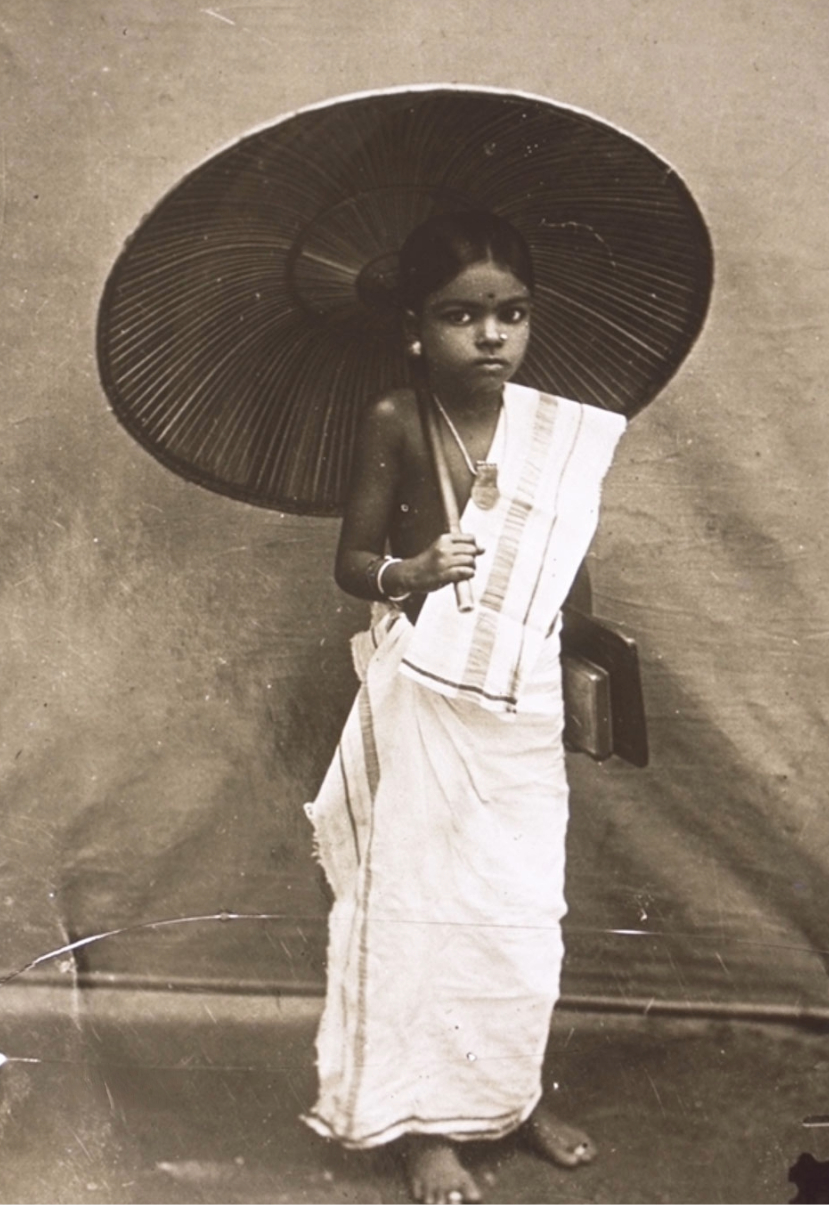 Image of a pre-modern Kerala upper-class girl girl wearing the upper cloth.